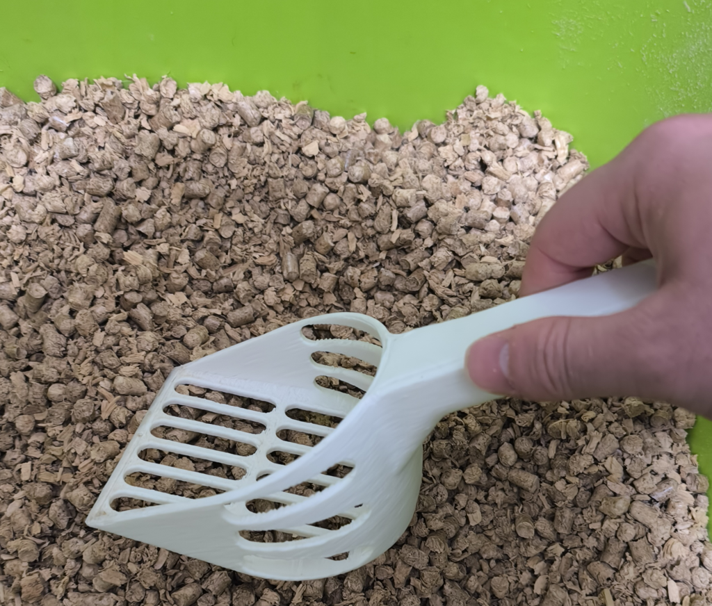 Recogedor para caja de arena